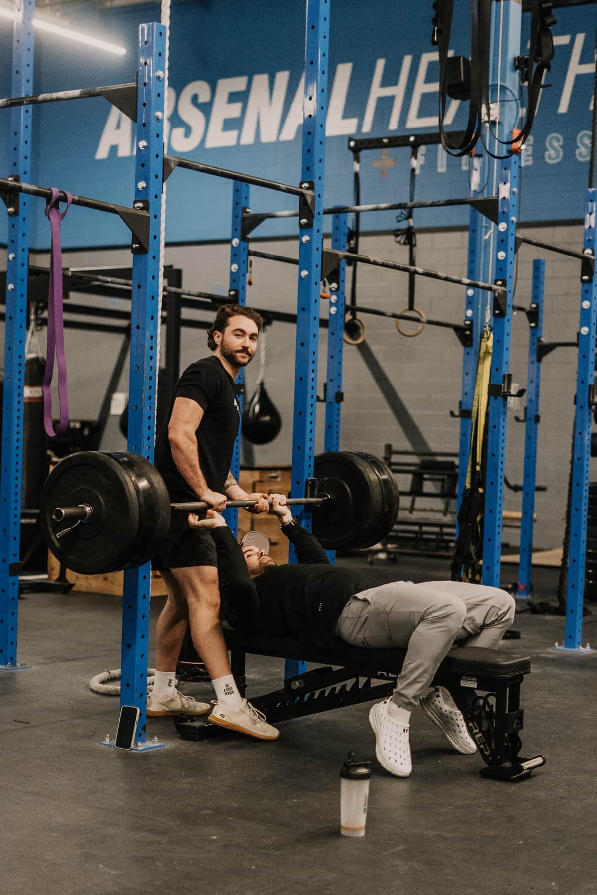 Certified personal trainer coaching a client at Arsenal Health Denver